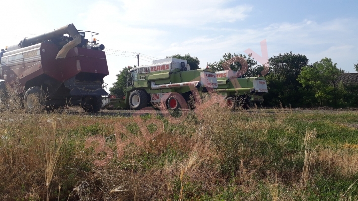 2 немца и 3 белоруса.Claas и Палессе